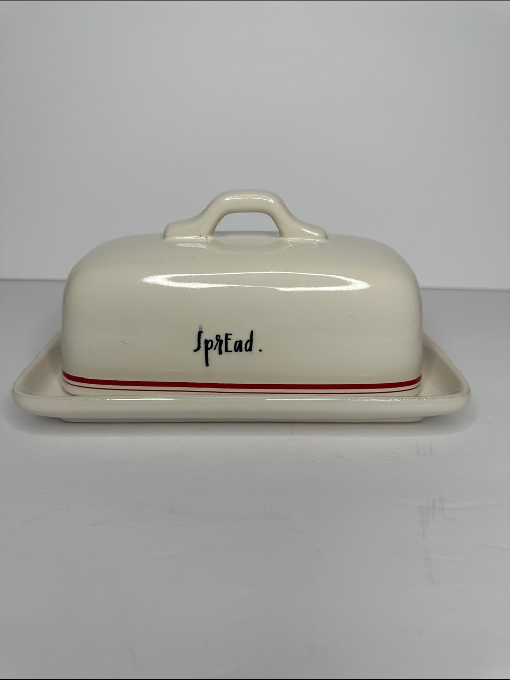 Rae Dunn Ceramic Butter Dish - 'Spread' Ivory with Red Stripe